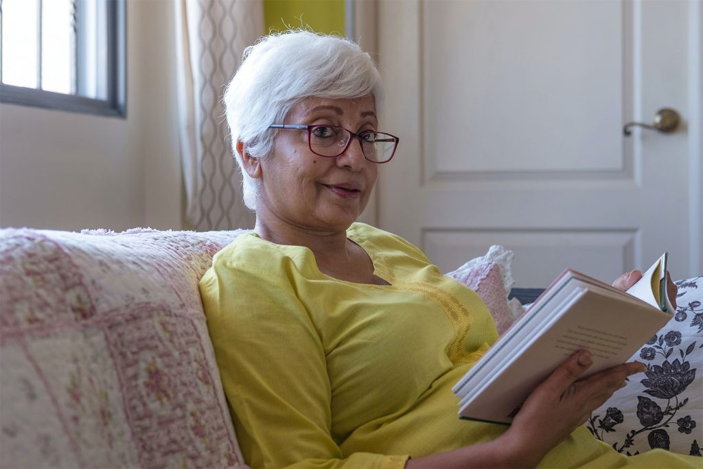 old lady reading a book